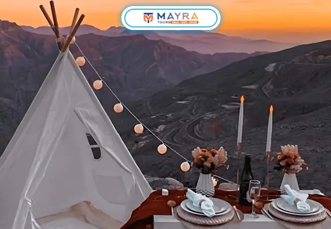 jebel jais ras al khaima tour picture with tends and candles with food (1)