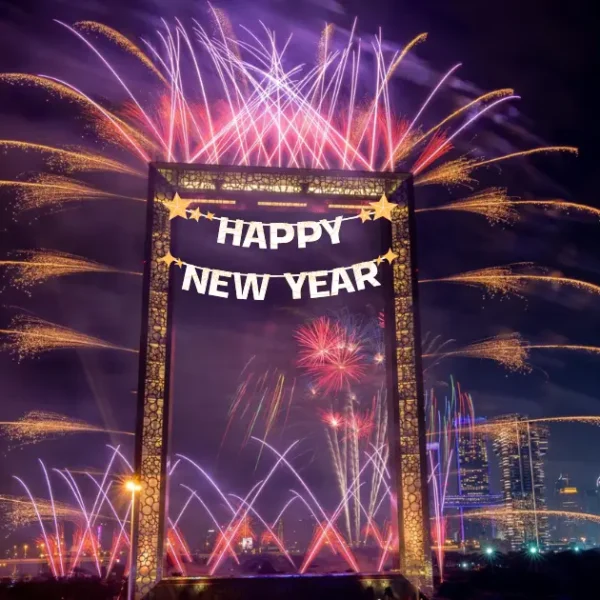 Dubai Frame with New Year's fireworks lighting up the night sky during NYE celebration at iconic landmark