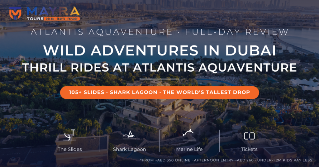Atlantis Aquaventure waterpark aerial with Tower of Poseidon slides, Palm Jumeirah and Dubai Marina skyline - full-day thrill rides review 2026 by Mayra Tours