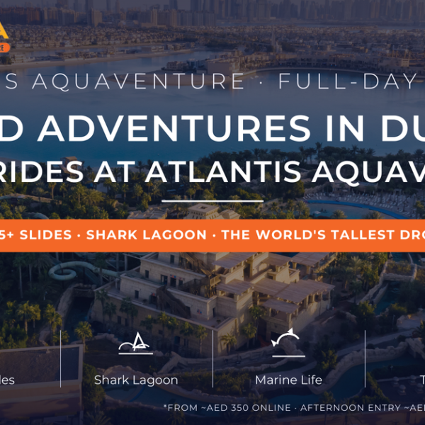 Atlantis Aquaventure waterpark aerial with Tower of Poseidon slides, Palm Jumeirah and Dubai Marina skyline - full-day thrill rides review 2026 by Mayra Tours