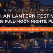 Women in conical hats on a sampan among floating candle lanterns on the Thu Bon River at dusk - Hoi An Lantern Festival 2026 dates and guide from Dubai by Mayra Tours