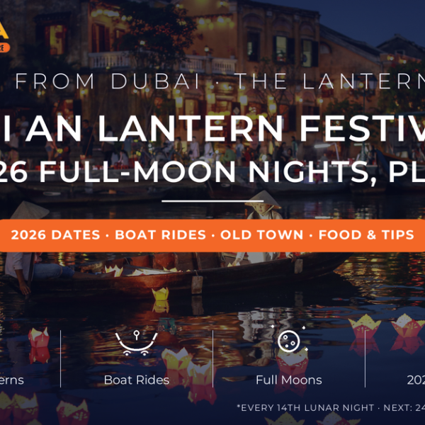Women in conical hats on a sampan among floating candle lanterns on the Thu Bon River at dusk - Hoi An Lantern Festival 2026 dates and guide from Dubai by Mayra Tours